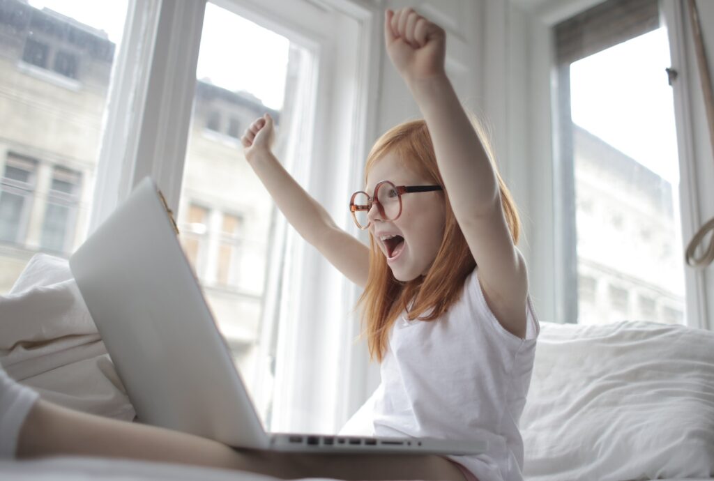 Photo Of Child Putting Her Hands Up